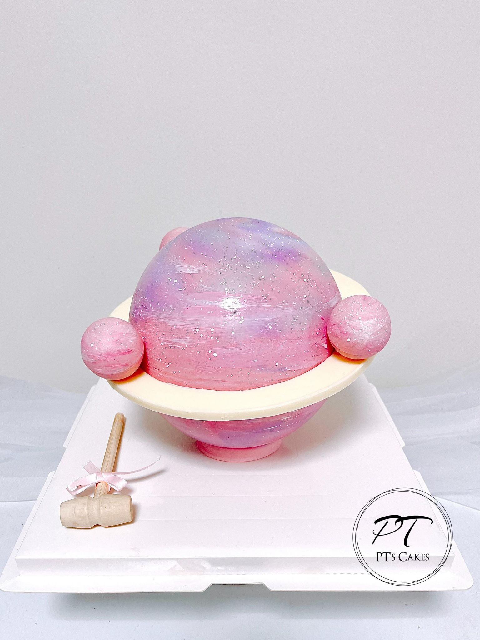 Pink galaxy pinata cake